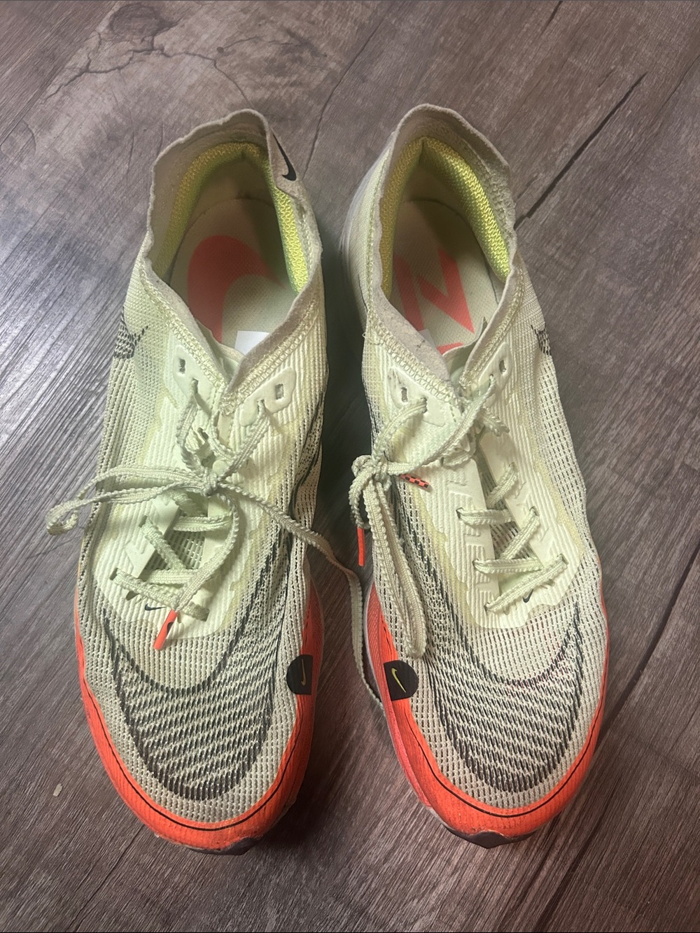 Nike ZoomX Vaporfly running shoes feature Light Yellow Running Shoes